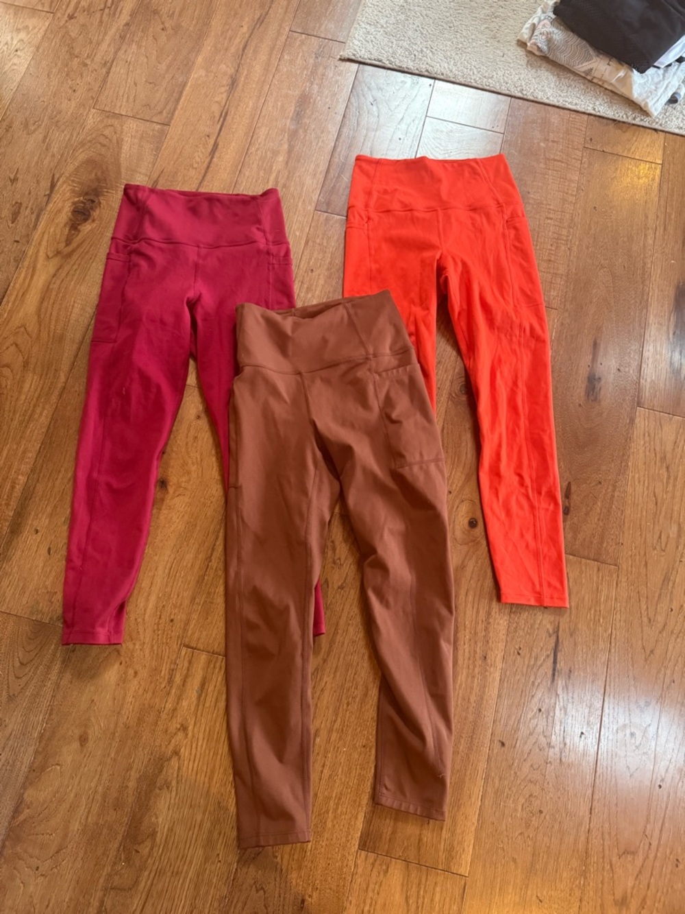 Carbon women’s ' High-Waist Leggings in Berry, Rust, and Brick Red